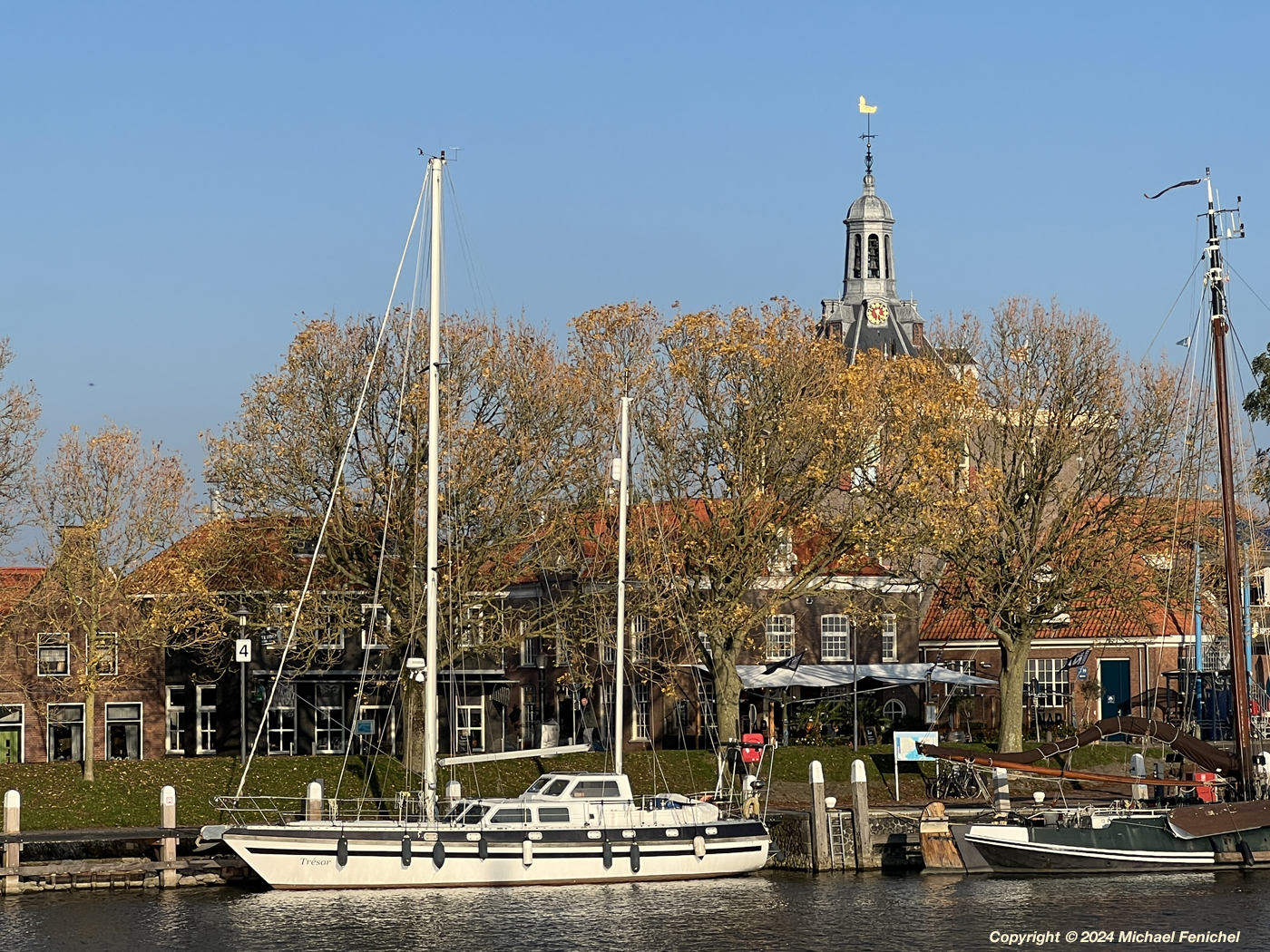 [Boats and Autumn Foliage]